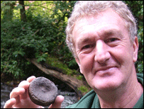 Paul Bennett with the fossil of a prehistoric sea monster